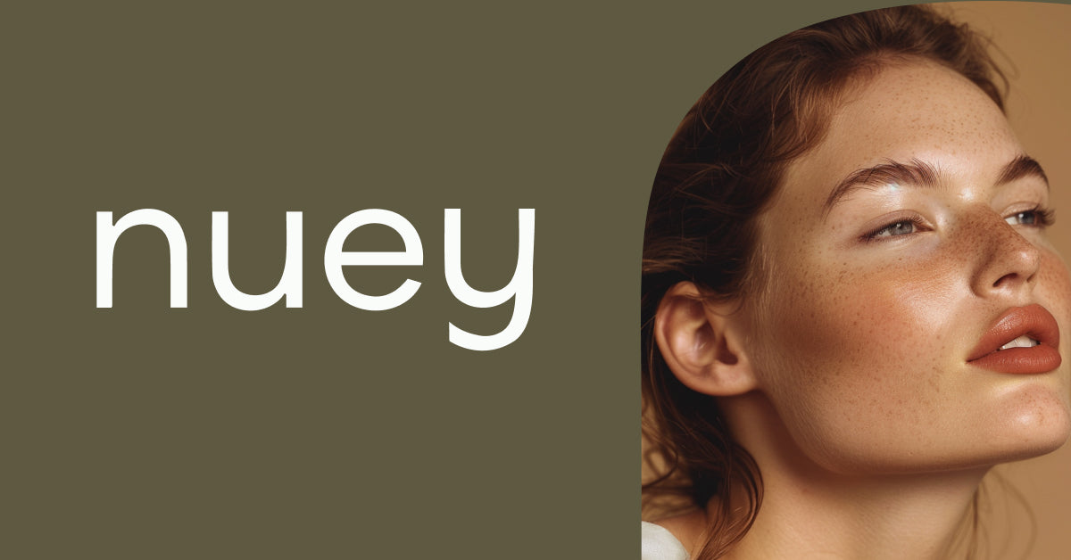 Clean, professional medical spa treatment room with neutral tones at Nuey Aesthetics & Wellness - Newport Beach in Laguna Beach